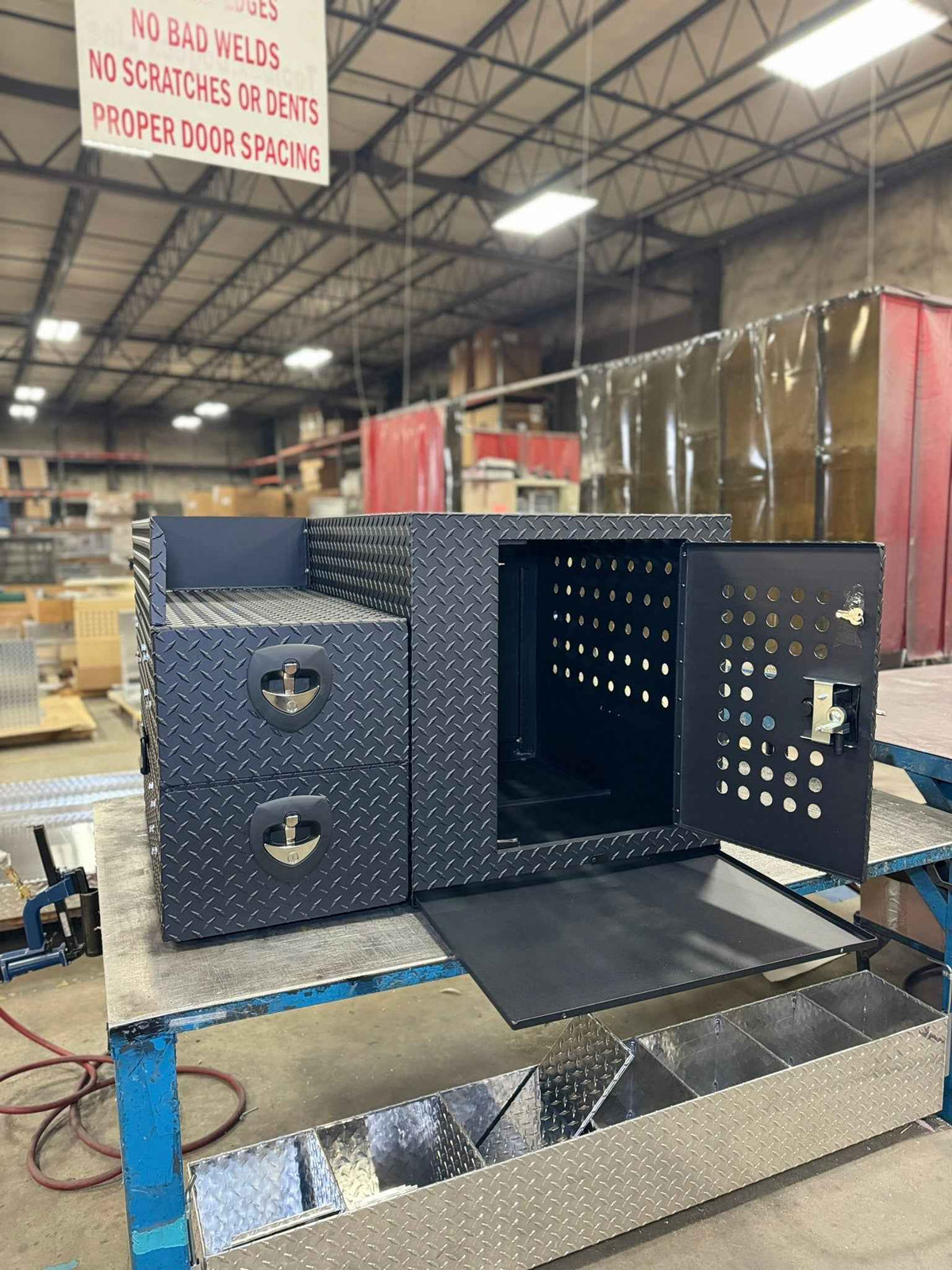 Dog Crate 55500 Professional K9 Series Rear Deployment Unit / Single Compartment / Side Drawer Storage / 45 W X 38 D X 31 H / Holes for Ventilation / Black / Diamond Tread Aluminum/ Owens Products